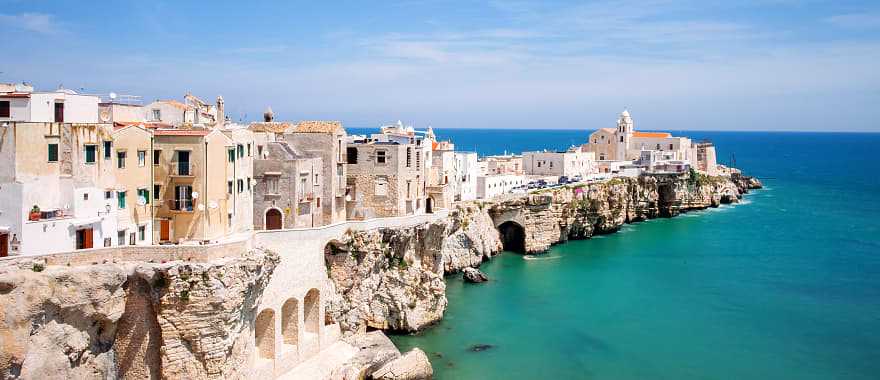 Beach town in Vieste, Italy on a sea cliff in Italy