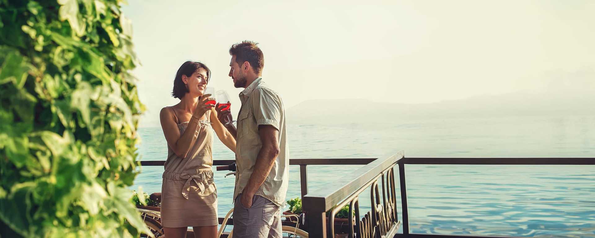 Romantic Italy Tours for Couples Couple at a lake in Italy.