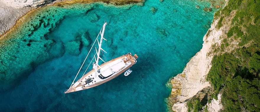 Yacht in a private cove in the Greek Islands.