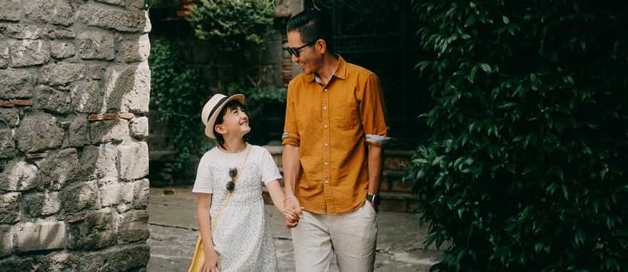Father and daughter at a medieval town in Italy.  