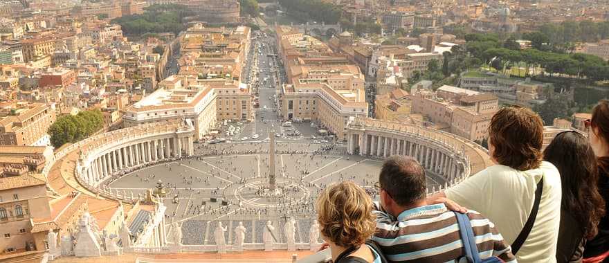 Traveling family admiring the Vatican in Rome, Italy