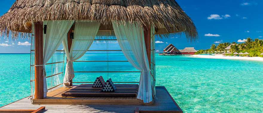 Romantic spa bungalow over the water in Tahiti.