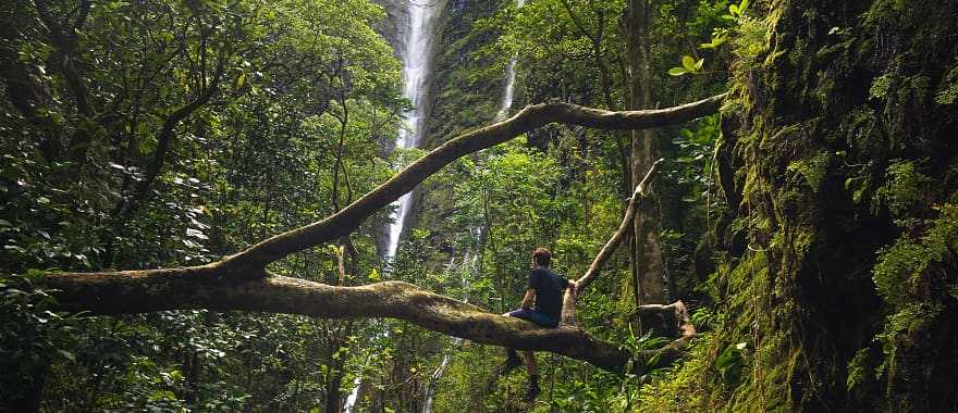 Solo hiker at Alajuela waterfall in Costa Rica