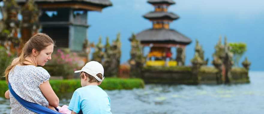 Mother and kids at Bratan Water Temple in Bali, Indonesia