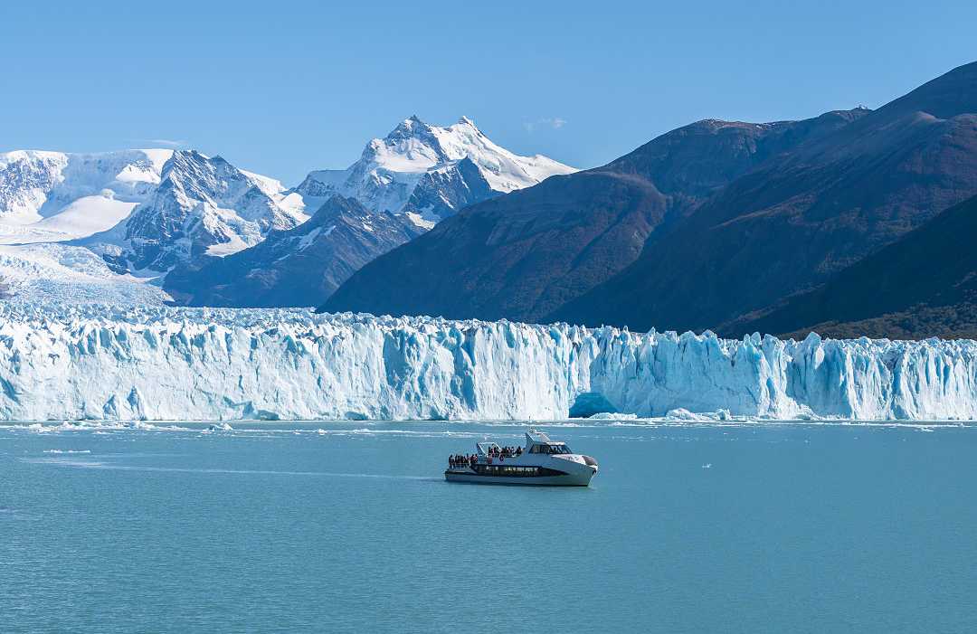 Perito Moreno glacier, Argentina Ferry boat in front of Perito Moreno glacier in Argentina